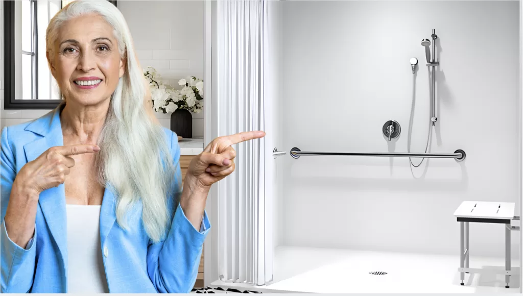 Representative pointing to ADA roll-in showers for university and commercial facilities